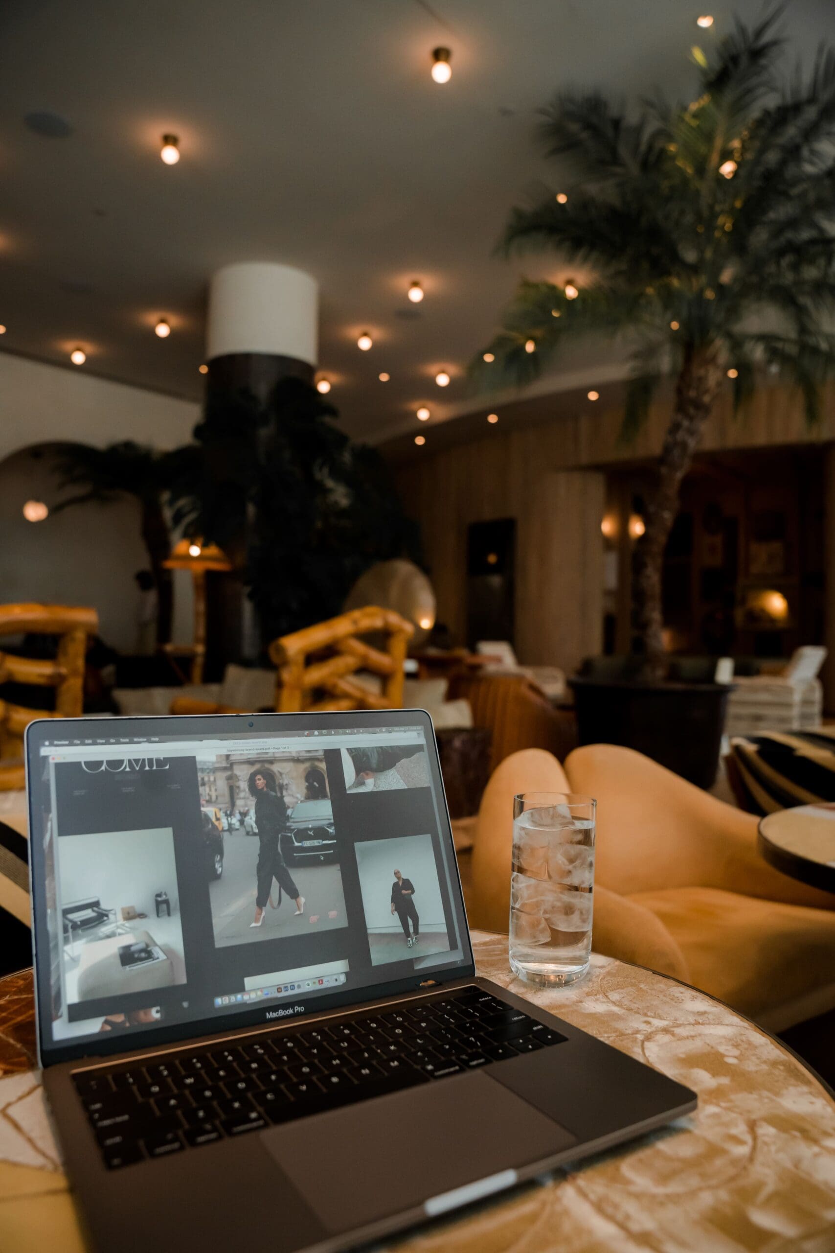 Shopper browsing fashion products on a laptop during a Shopify campaign landing page experience